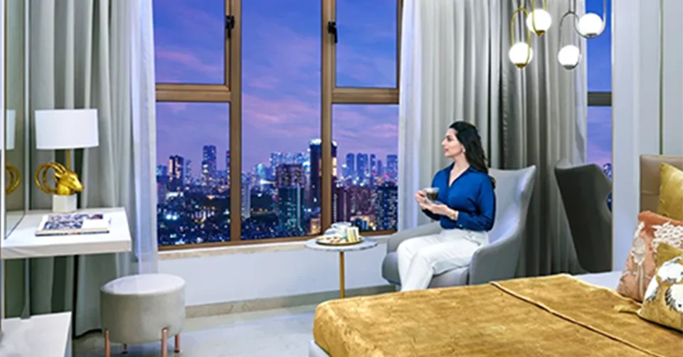 Elegant living room with blue ottoman